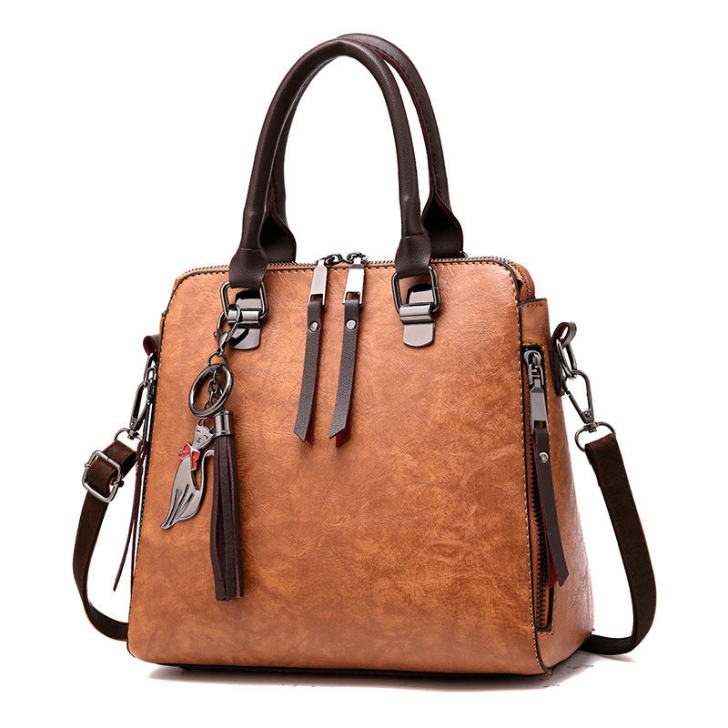 2019 new retro handbag handbags shoulder messenger bag fashion tassels tide middle-aged bag Classy’s