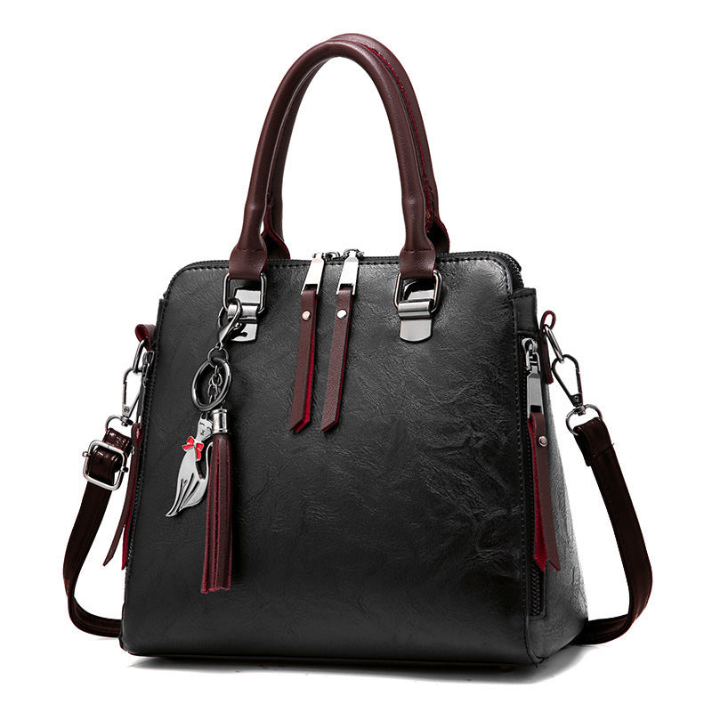 2019 new retro handbag handbags shoulder messenger bag fashion tassels tide middle-aged bag Classy’s