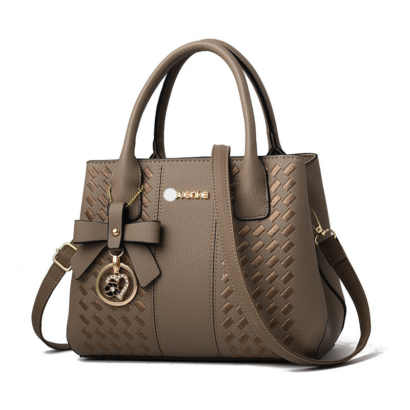 Bag women 2021 European and American fashion handbags trendy middle-aged embroidered thread one-shoulder messenger bag handbag Classy’s