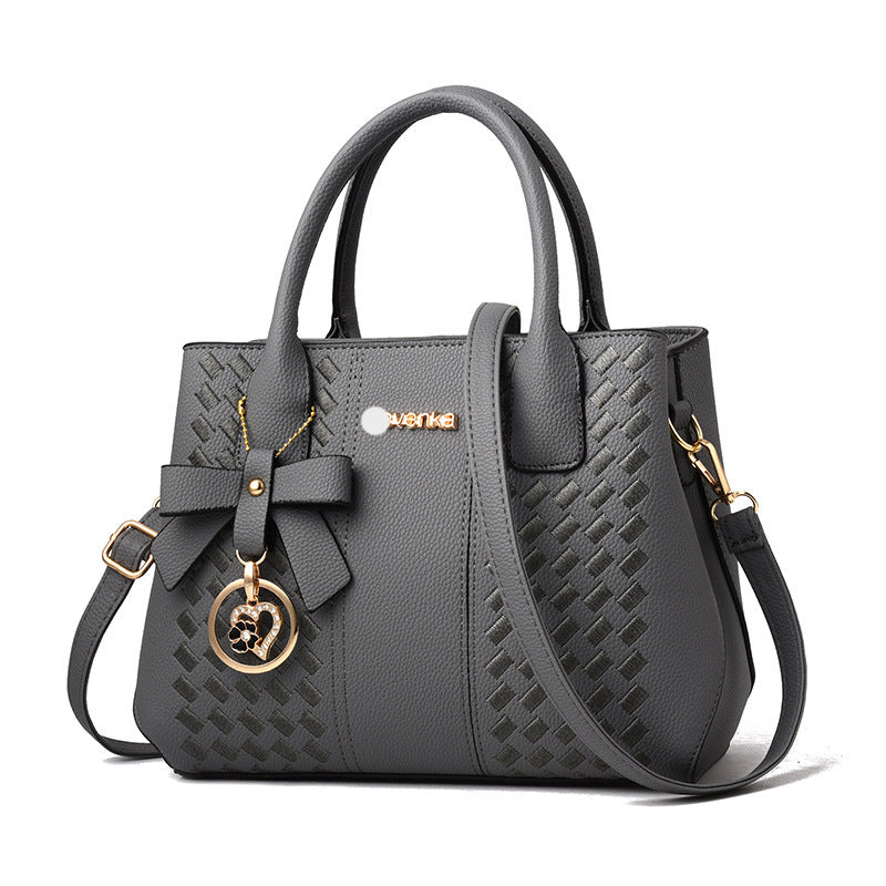 Bag women 2021 European and American fashion handbags trendy middle-aged embroidered thread one-shoulder messenger bag handbag Classy’s