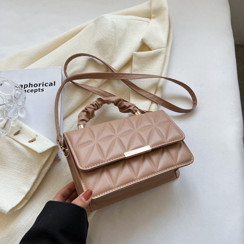 The women's textured diamond-shaped embroidered thread pleated handbag is spring and stylish, and the single-shoulder crossbody bag is trendy Hypersku