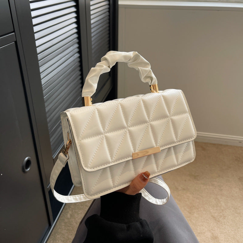 The women's textured diamond-shaped embroidered thread pleated handbag is spring and stylish, and the single-shoulder crossbody bag is trendy Hypersku