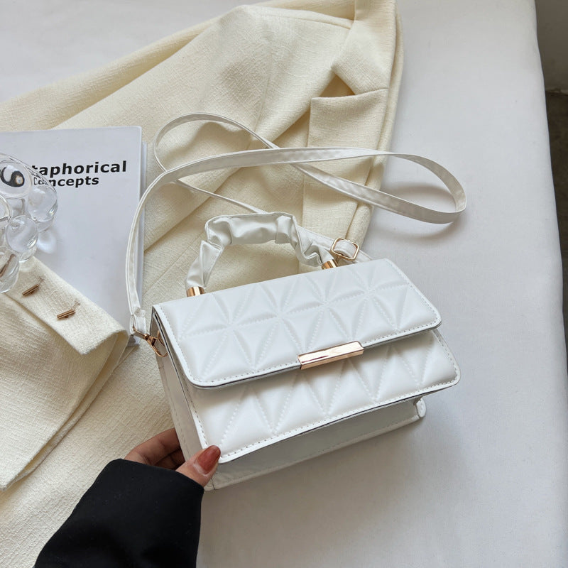 The women's textured diamond-shaped embroidered thread pleated handbag is spring and stylish, and the single-shoulder crossbody bag is trendy Hypersku