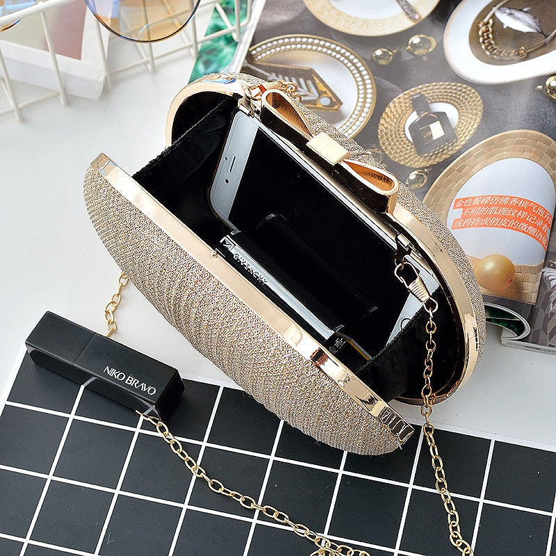 Golden Evening Clutch with Metal Bow eprolo
