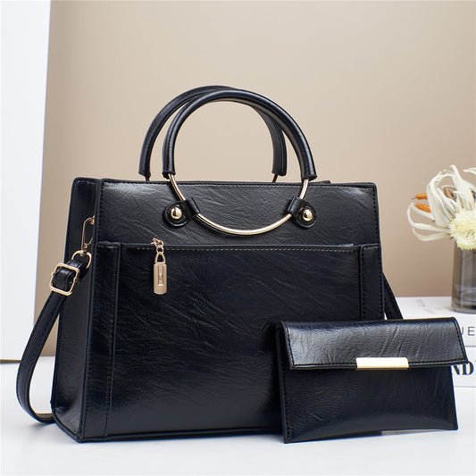 Ladies handbags new large capacity shoulder bag temperament soft leather mom bag fashionable commuter women's bag can be cross-body Classy’s