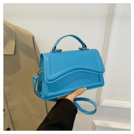 Western-style handbags for women 2024 spring and summer new heavy-colored shoulder messenger bags fashionable textured solid color small square bags Classy’s