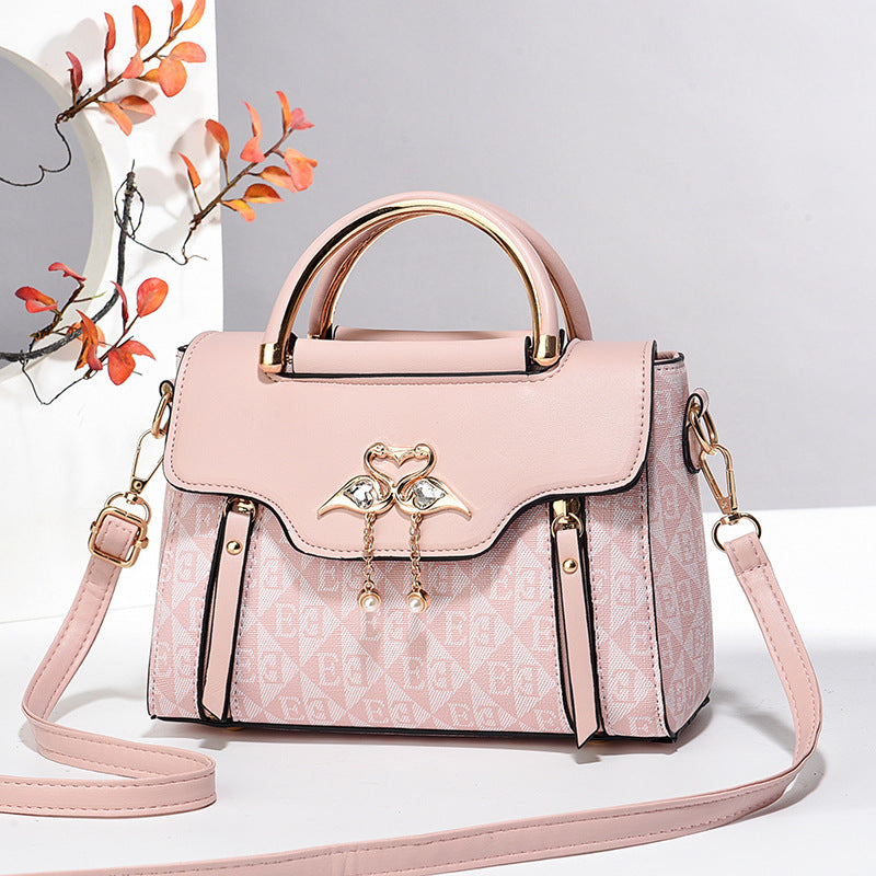 Women's handbags 2024 new fashion trend embossed solid color versatile casual shoulder messenger bag Classy’s