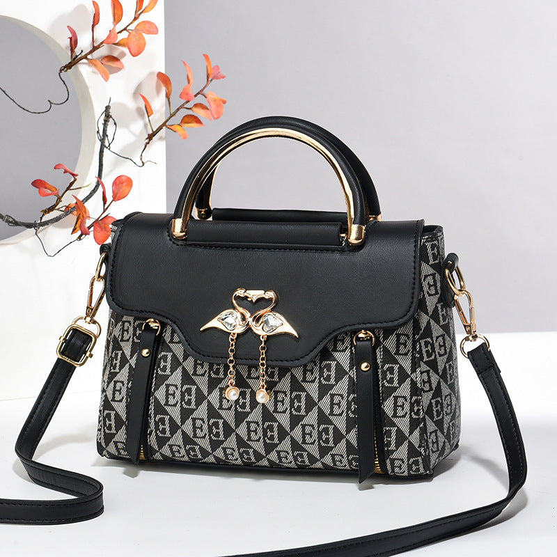 Women's handbags 2024 new fashion trend embossed solid color versatile casual shoulder messenger bag Classy’s