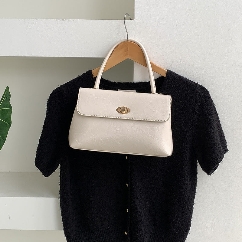 Retro handbags, fashionable niche design, versatile messenger bag, waxed leather, stylish flip-top hand-held small square bag Classy’s