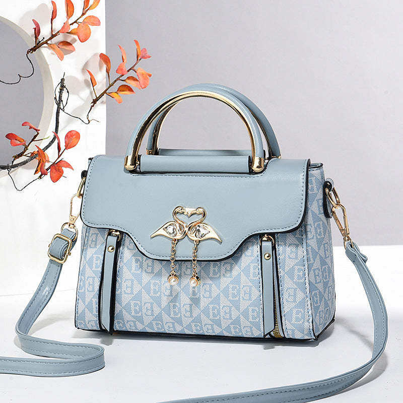 Women's handbags 2024 new fashion trend embossed solid color versatile casual shoulder messenger bag Classy’s