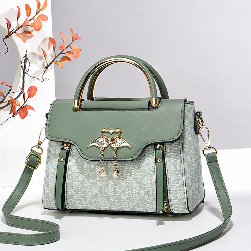 Women's handbags 2024 new fashion trend embossed solid color versatile casual shoulder messenger bag Classy’s