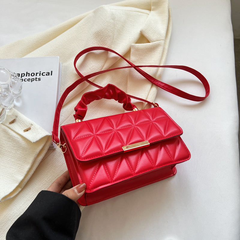 The women's textured diamond-shaped embroidered thread pleated handbag is spring and stylish, and the single-shoulder crossbody bag is trendy Hypersku